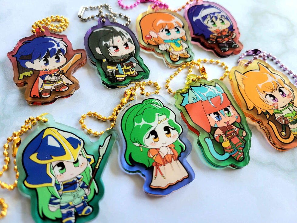 Fire Emblem POR photograph of 8 path of radiance character acrylic charms. characters include ike soren myst mia nephenee elincia lethe ranulf and
